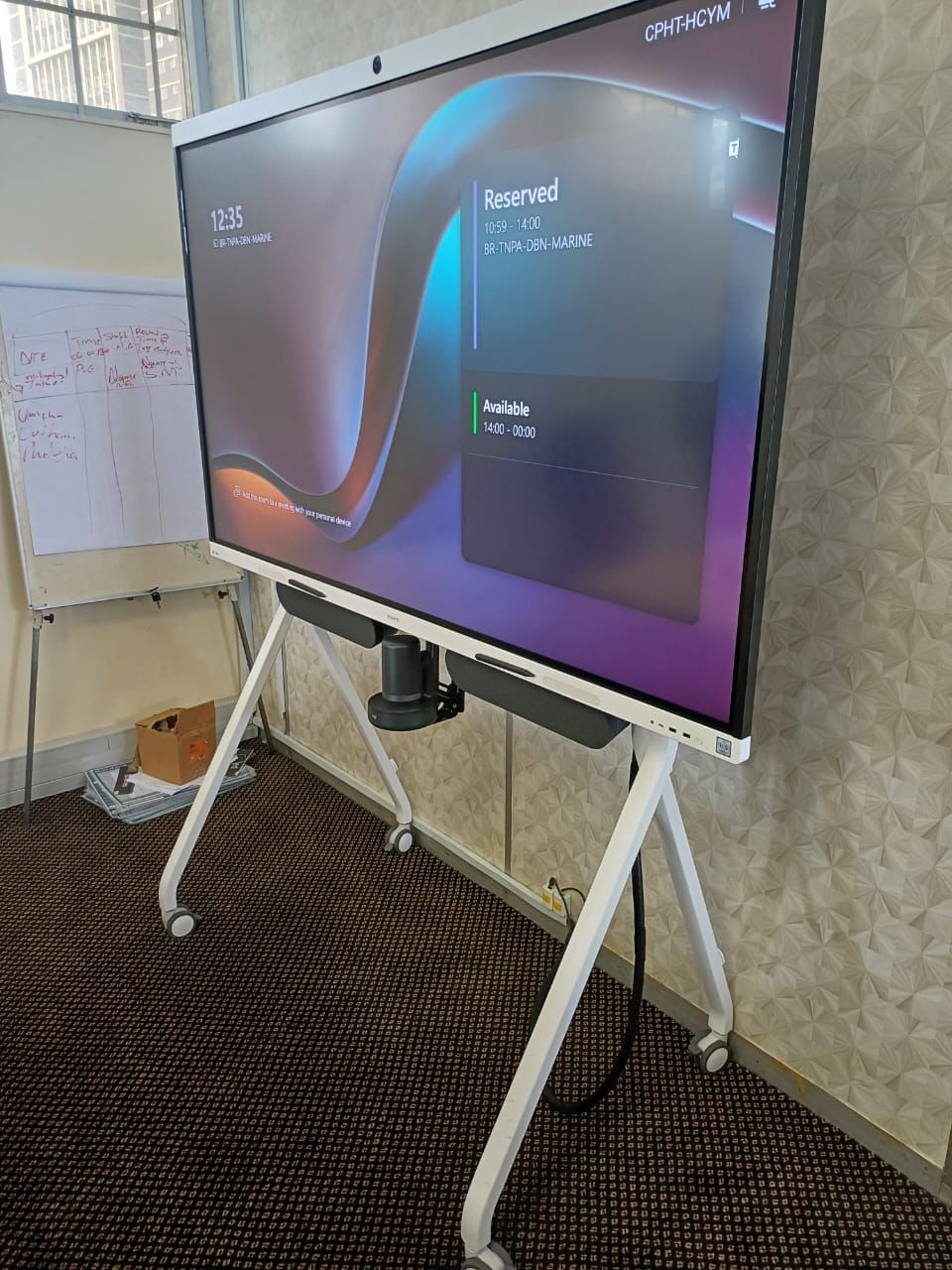 Interactive display installed in a modern meeting room